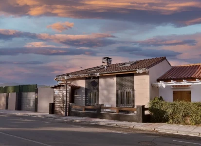 Aplicación de ELASTICOVER FINE y ELASTICOVER TECH imitación a ladrillo. Vista general de una casa unifamiliar a la que se ha aplicado ELASTICOVER FINE y ELASTICOVER TECH imitando ladrillos y bloques.